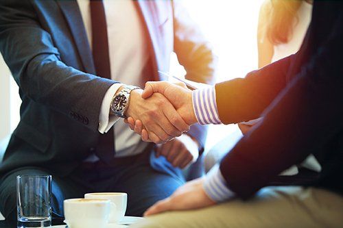 Businessman and Attorney Shaking Hands — Danville, KY — McClure & McClure