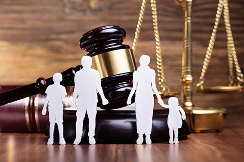 Family Cut-Outs and a Gavel — Danville, KY — McClure & McClure